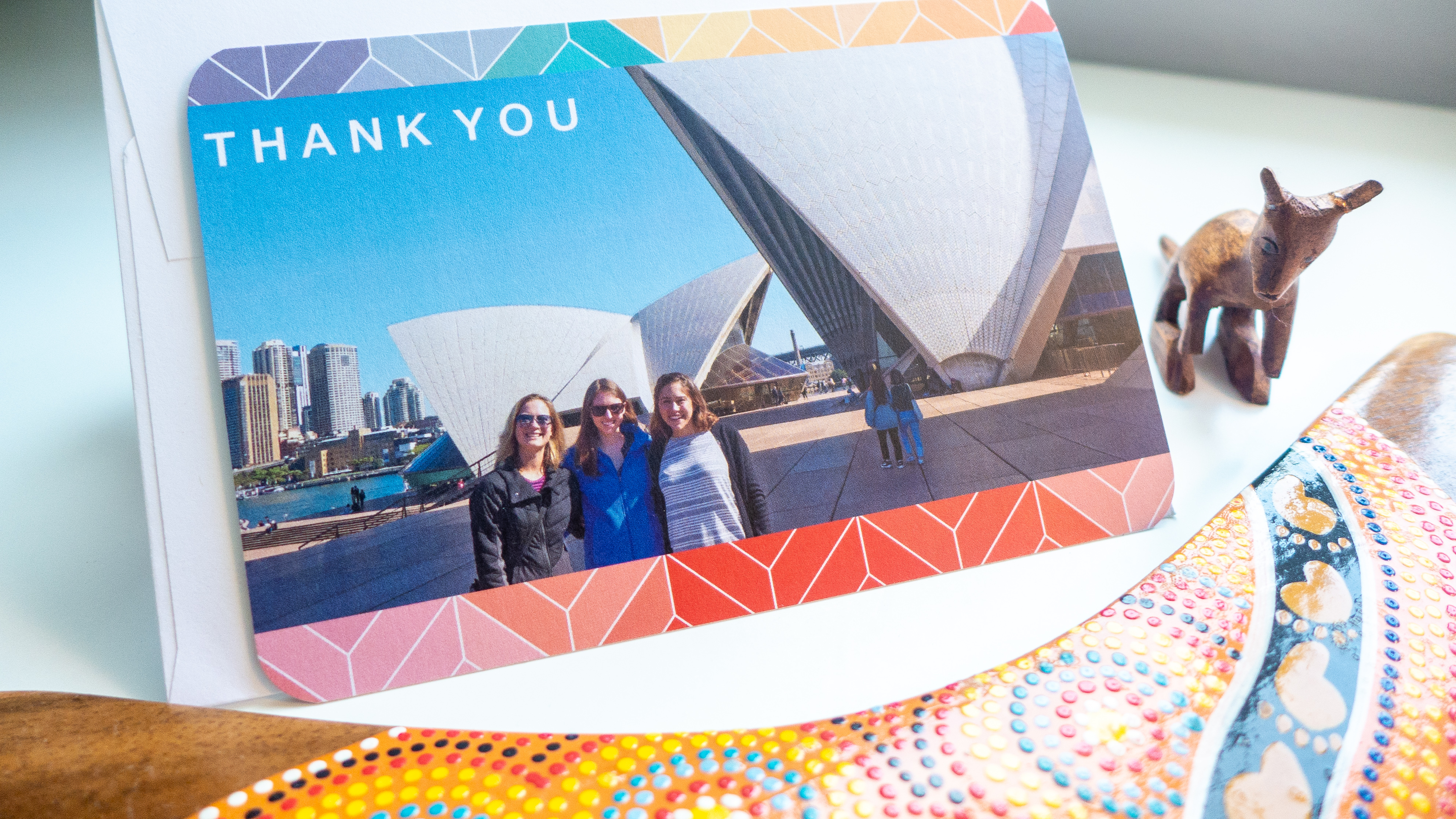 I said thanks by sending a thank you greeting card by Mixbook, seen here with Australian souvenirs