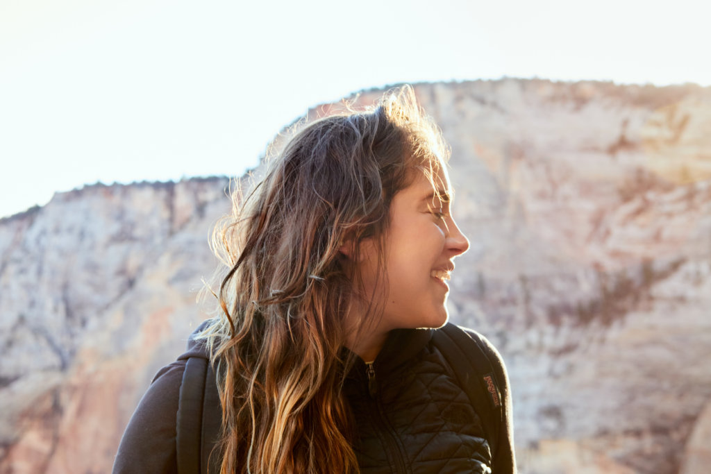 solo travel in Zion National park, photo of a woman solo traveler