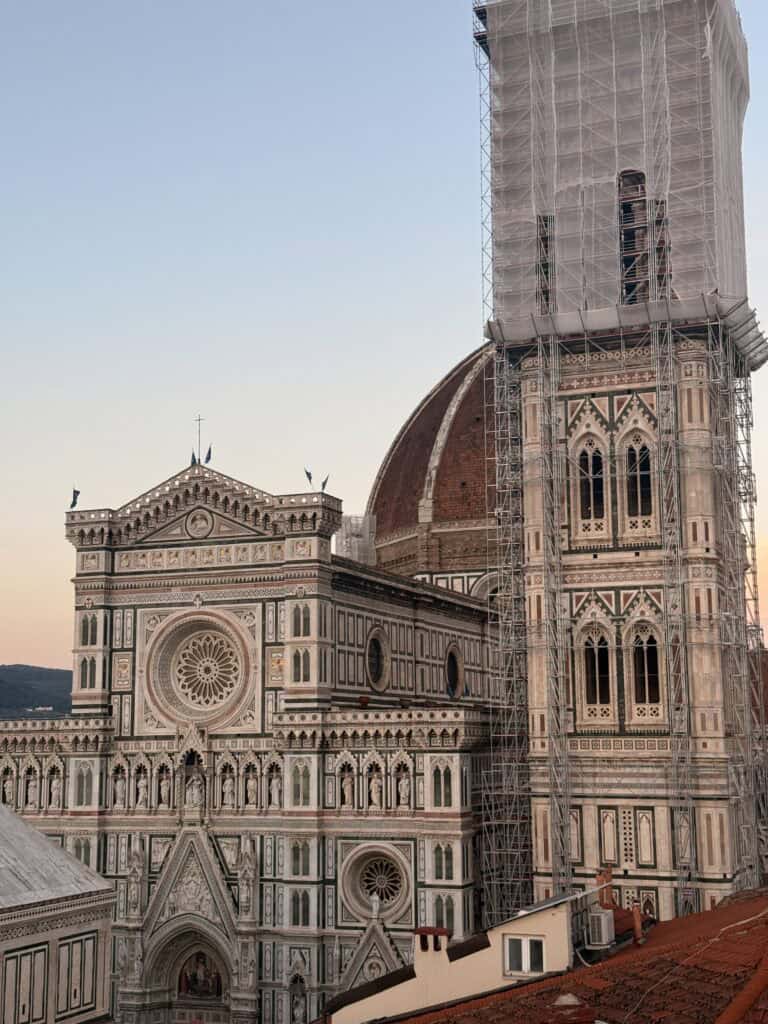 The Florence Cathedral with its dome and a campanile encased in scaffolding, a must-see during your 3 days in Florence.